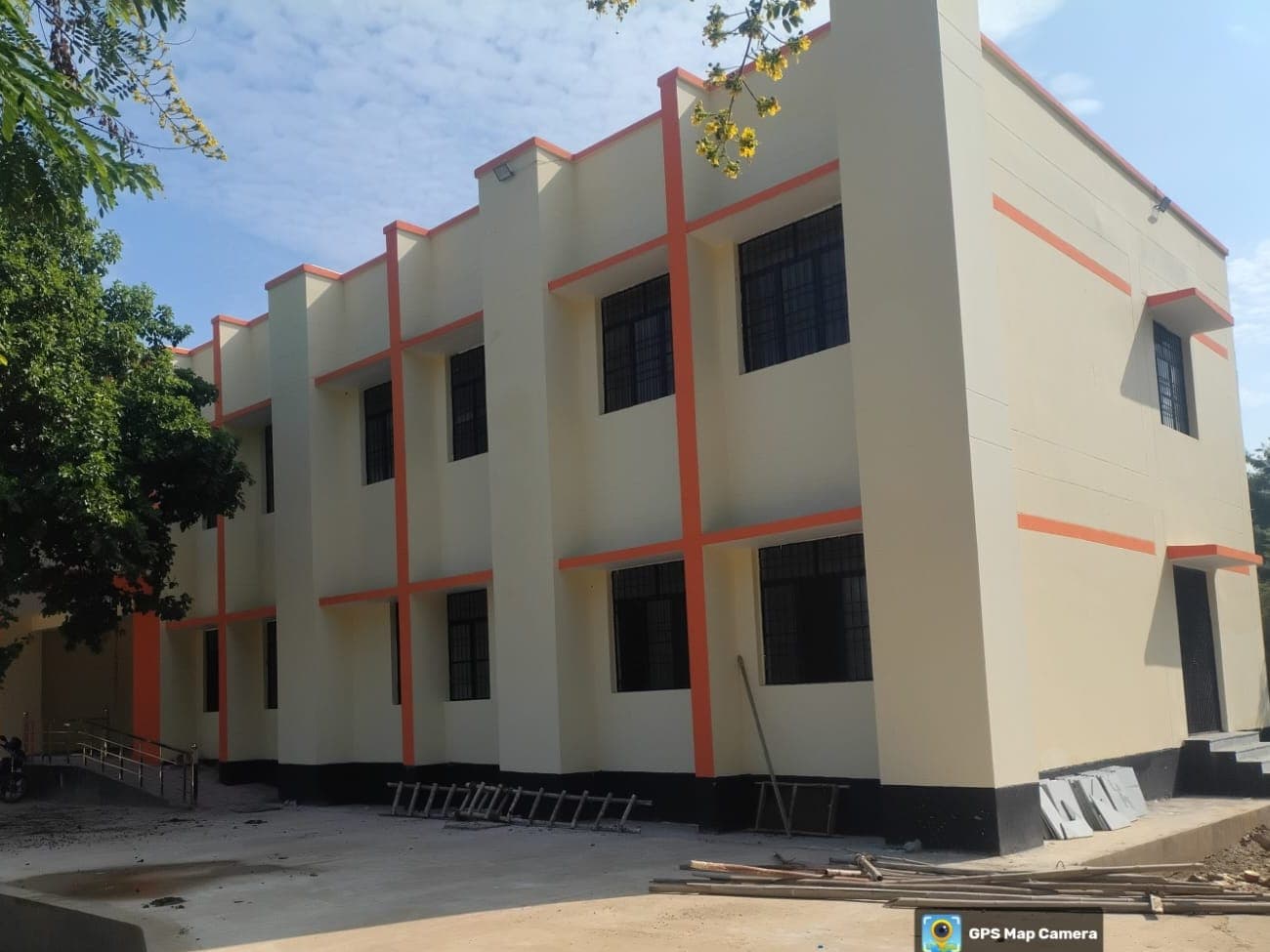 Cream and orange two-storey main building of ITI Vrindavan